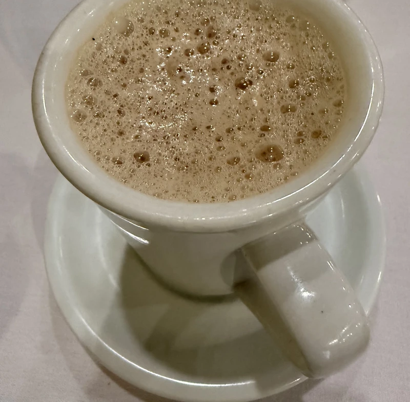 Saffron masala tea served at Tamarind Regina South